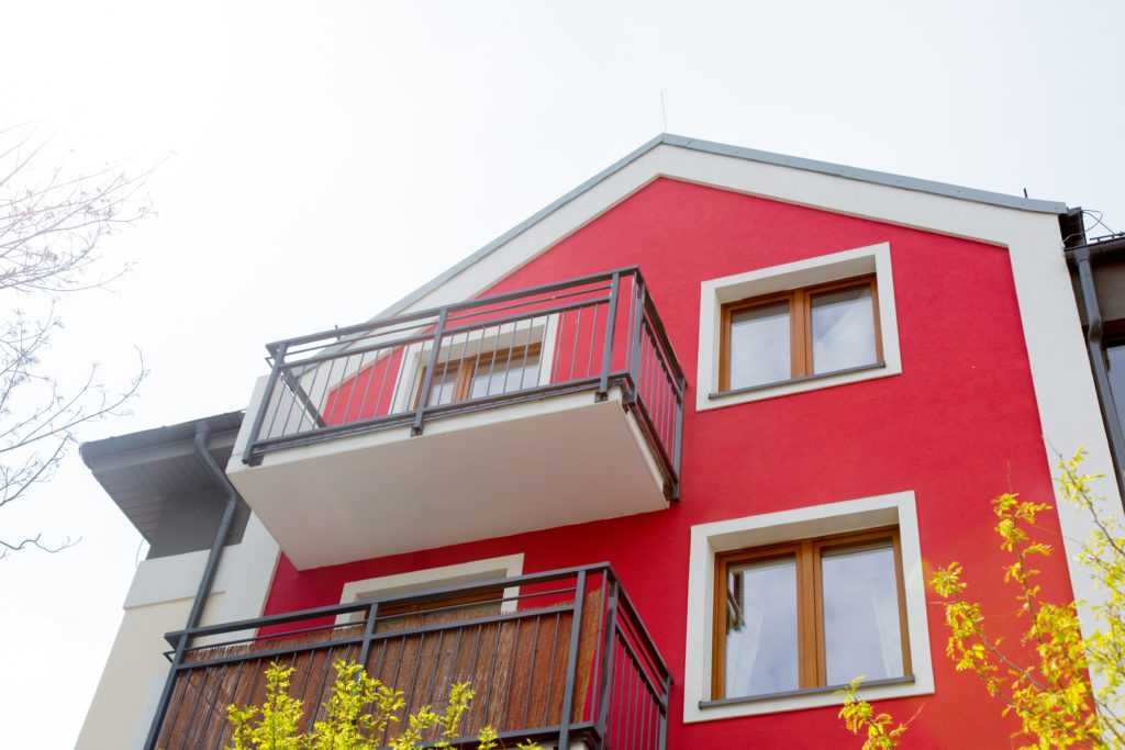 Red home with balcony