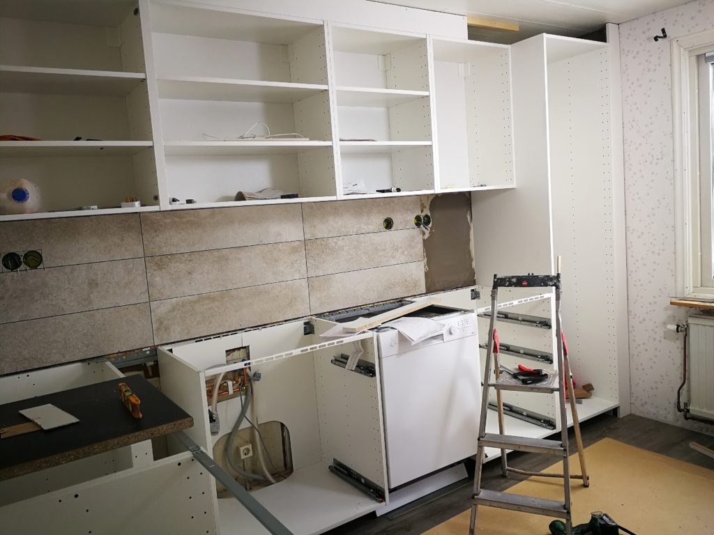 small kitchen with new backsplash