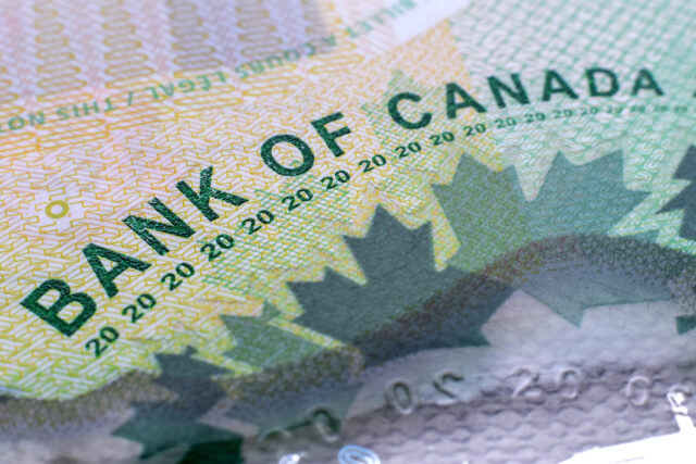 Closeup macro Bank of Canada words on a green 20 dollar Canadian