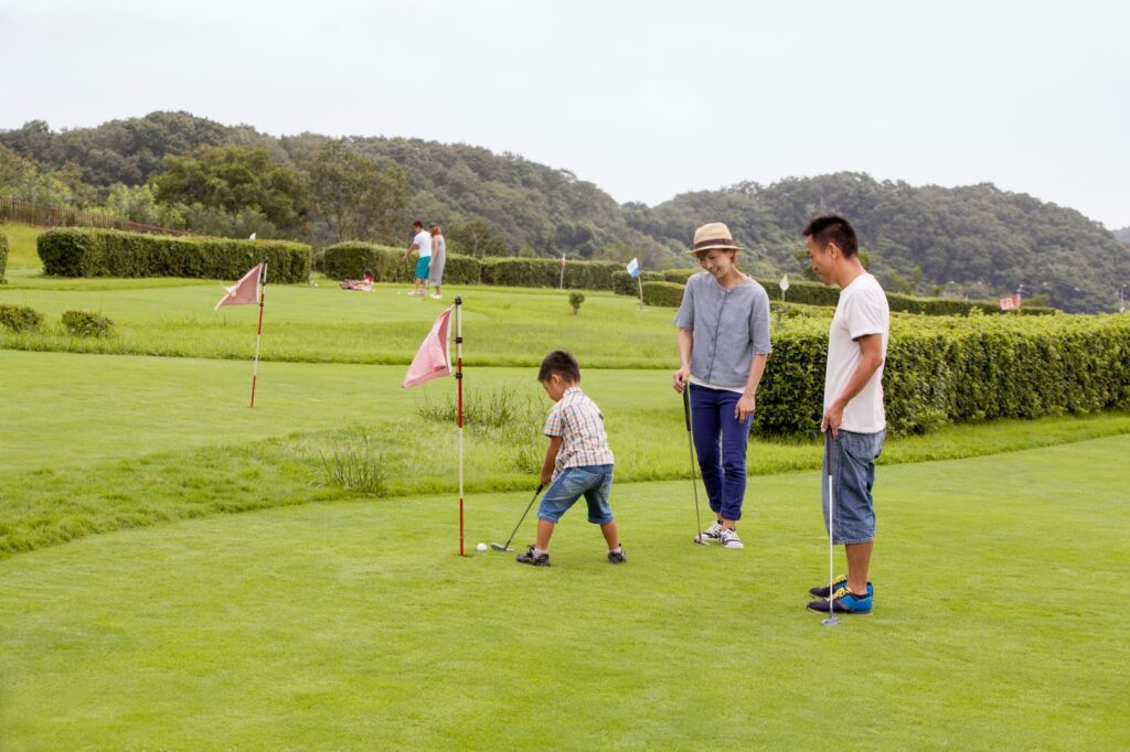 A family playing golf