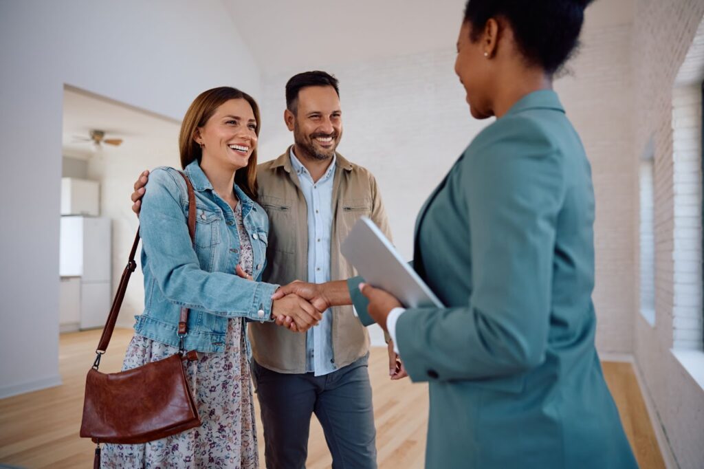 A realtor meeting clients for the first time
